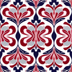 Delightful red, white, and blue floral pattern against a pristine white backdrop, featuring a paisley motif and an enchanting seamless design.
