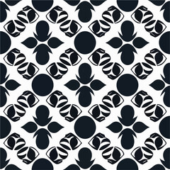 Fototapeta premium Timeless fabric pattern featuring a repetition of black and white shapes on a white background, reminiscent of traditional aizome patterns with a touch of art deco influence.