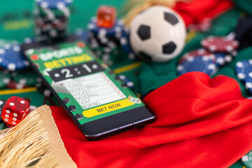 Gambling online casino Internet betting concept green screen. smartphone with poker chips, dice. Jackpot, casino chips.