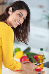 young woman cooking in the kitchen