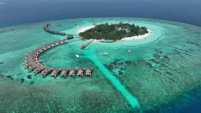 Aerial views of Thulhagiri Island Resort with water bungalows