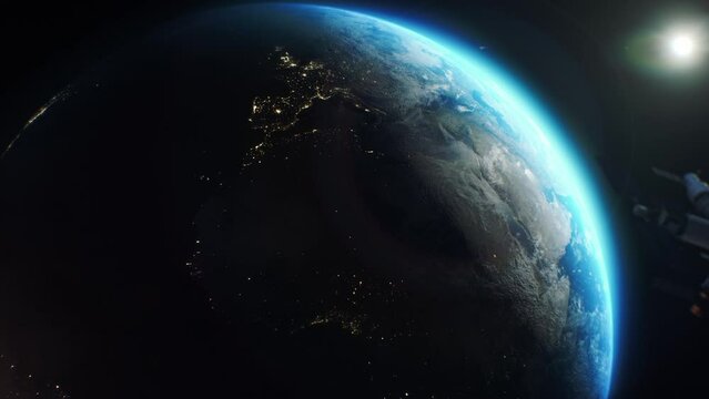 3D motion graphics of Earth globe rotating in outer space. Satellite or ISS flies in planet orbit. View of the night cities lights from space. Day-night transition. Discovery and exploration concept.