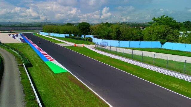 driving school. aerial view of a race track open for motorcycle training. drone footage. A group of motorcyclists. Moto sport. Italy Misano 10.2023