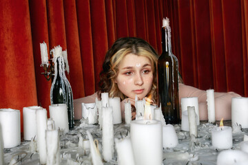 beautiful young woman with candles