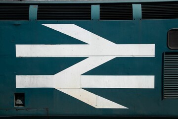 British Rail double arrow emblem on the side of a diesel locomotive.