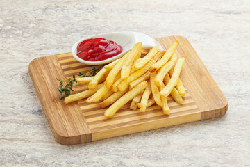 French fried potato over board