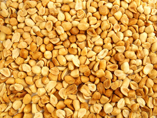 Fresh roasted peeled Peanuts Background