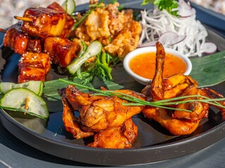 Delicious meal of grilled meats and fresh seasonal vegetables
