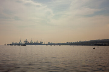 Naklejka premium Istanbul, beylikduzu - Turkey - 05.08.2023: Ambarli Shipyard, International Sea Port, Clear Sky, Silhouette View of Logistic Business Center.