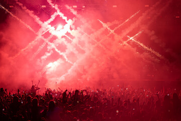 Euphoric Energy: Dynamic Concert Crowd immersed in Flashing Lights and Pyrotechnics