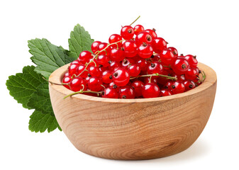 Red currant in a wooden plate close-up on a white background. Isolated