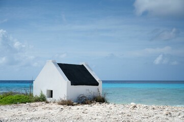 Scenic view of Slave hut on the beach in Bonaire