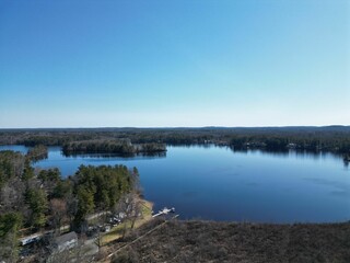 Aerial view of the serene Kingston Lake on a sunny day in Kingston,NH