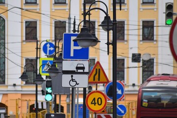 Variety of traffic and pedestrian signage in the street