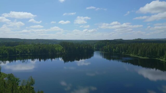 Stunning Aerial SHot of Forest and Lake at Isaberg Mountain Resort in Sweden. 4K Drone Footage