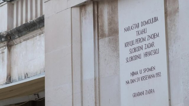 A sign carved in stone on People's square in Zadar, Croatia that citizens of Zadar erected in memory of 1992 and free town.
