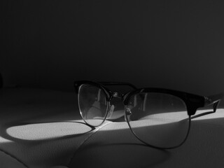 glasses on black background