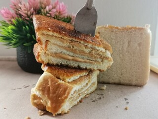 slice of bread with peanut butter