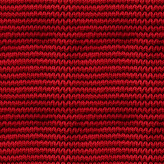 Red knitted fabric, seamless pixel perfect pattern texture.