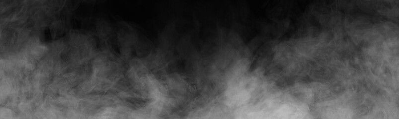 Abstract smoke texture over black. Fog in the darkness.