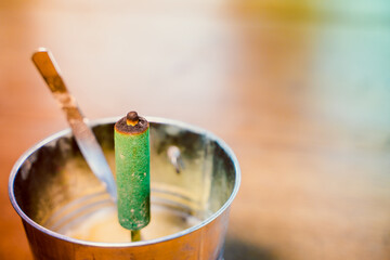 Insecticide Mosquito sticks in green color, close-up.Effective mosquito repellent outdoors