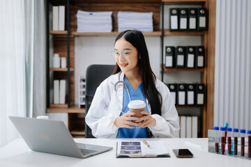 Medicine Asian doctor working with modern digital tablet computer interface as medical network concept