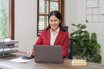 happy smiling businesswoman woman working on laptop computer, Young female making, Accounting woman taxes calculation