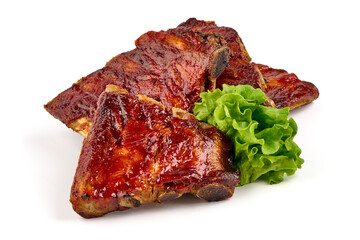 Roasted pork ribs in BBQ sauce with herbs, isolated on white background.