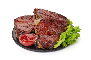 Grilled pork ribs in BBQ sauce with herbs, isolated on white background.