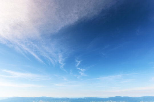 blue sky with fluffy clouds on a sunny day. beautiful nature background
