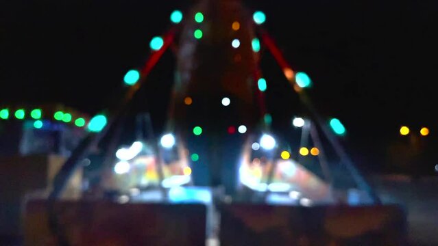 having fun at the amusement park, riding the gondola and night lights