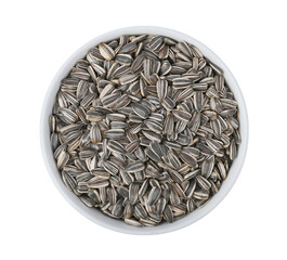 sunflower seed in white bowl on white background