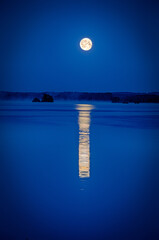 Full moon over the Swedish lake - 619424711