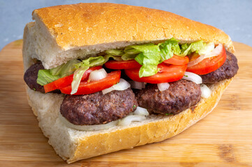 Delicious Turkish Meatballs Sandwich, Kofte Ekmek. Turkish name; kofte ekmek or ekmek arasi kofte