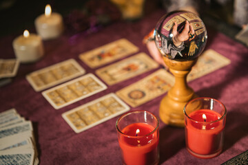 Fortune teller table with tarot cards and magic ball