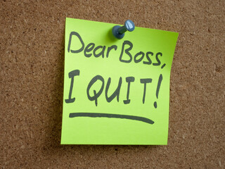 Pinned sticker with the inscription Dear boss, I quit. Employee quits concept.