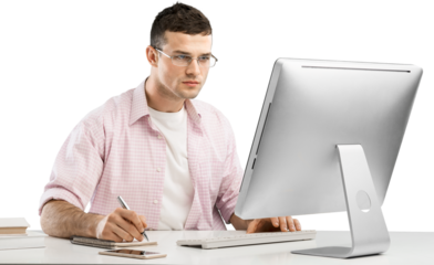 Smiling business man working on laptop at the home office.