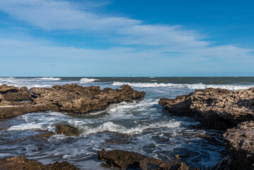 Rocky coast on a sunny day. Summer and travel concept