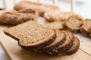 fresh loaf of bread on wooden board