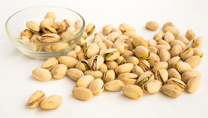 roasted pistachios on white background