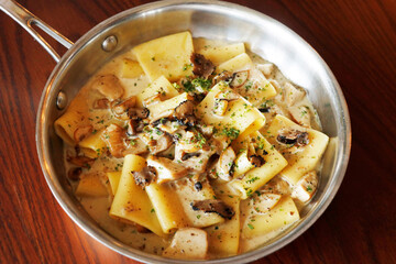 traditional italian creamy wild mushroom pasta with truffle, ceps and porchin