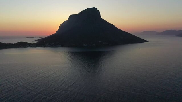 Drone shot, sea and hills in evening mood, village view of Mirties and Masouri, Telendos Island, Kalymnos, Dodecanese, Greece, Europe
