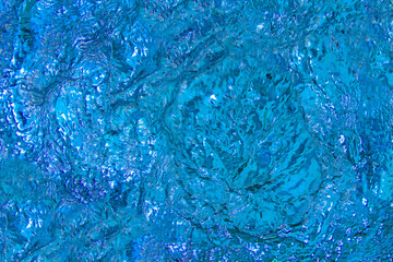 The roiling expanse of the sea's surface: An agitated and tumultuous ocean, with waves surging and swirling in a majestic spectacle