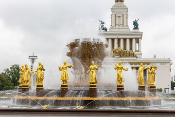 Russia. Moscow. ВДНХ. The Central Exhibition Pavilion and the Friendship of Peoples Fountain.