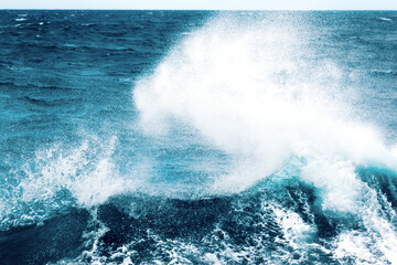 Ocean water background with foam. Ocean water splash. Not a calm