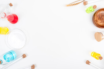 Top view science lab chemistry flask with beakers, flasks, and test tubes filled with colorful liquids