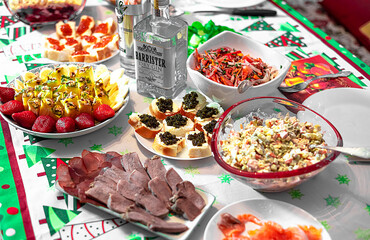Festive served table with a variety of dishes.