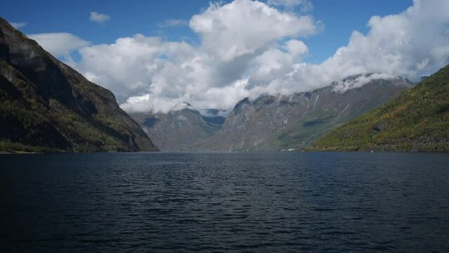 View from an electri al cruise ship on Sognefjord in Norway. Impressive mountain landscape of fjords and blue water