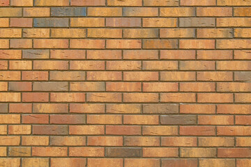 Section of a wall built of brown bricks in a retro style