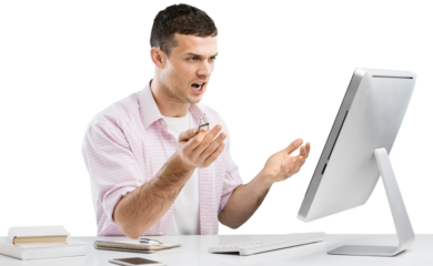 Young Caucasian man worker speak in glasses look at computer operational problems. Frustrated man surprised by unexpected error on computer device.